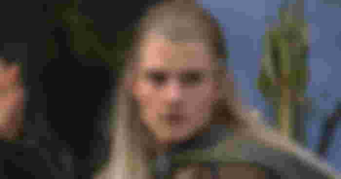 Legolas preparing to nock arrows in The Lord of the Rings The Fellowship of the Ring