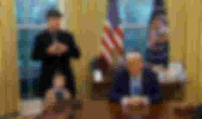 Elon Musk, his son, and President Donald Trump.