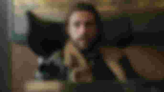 Kraven the Hunter talking to someone