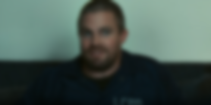 Stephen Amell as Garrett Kelton in Code 8: Part II