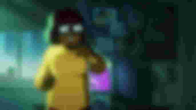 Mindy Kaling as Velma on the phone in Velma