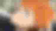 a close up of a person playing volleyball in a volleyball court .