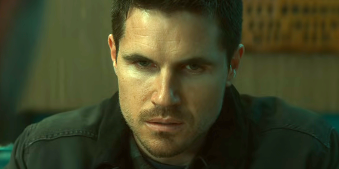 Robbie Amell as Connor Reed in Code 8: Part II