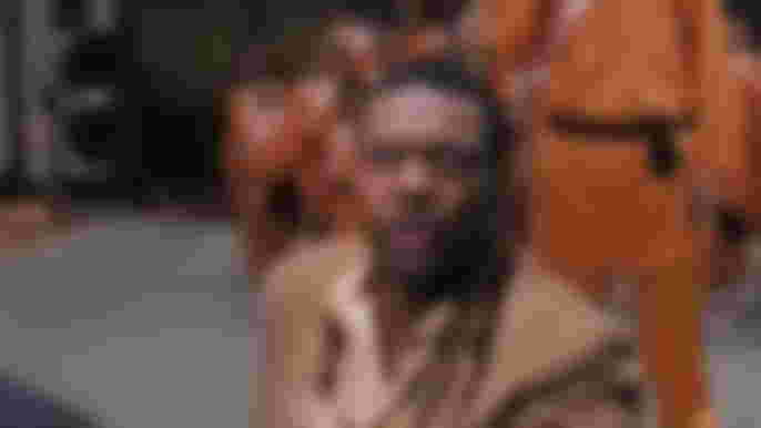 Chris Tucker as Detective James Carter in Rush Hour 3