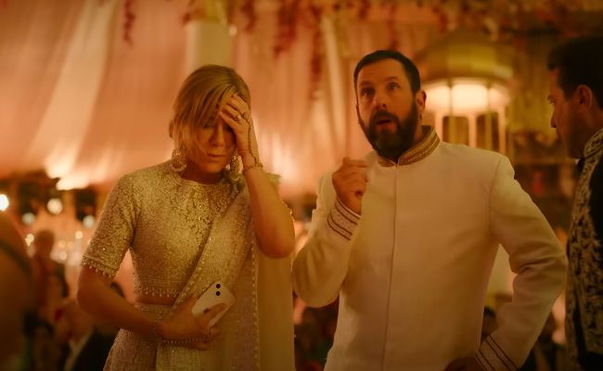 Jennifer Aniston as Audrey Spitz, Adam Sandler as Nick Spitz in Murder Mystery 2