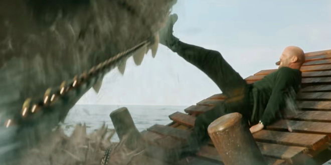 Jonas kicking a giant shark