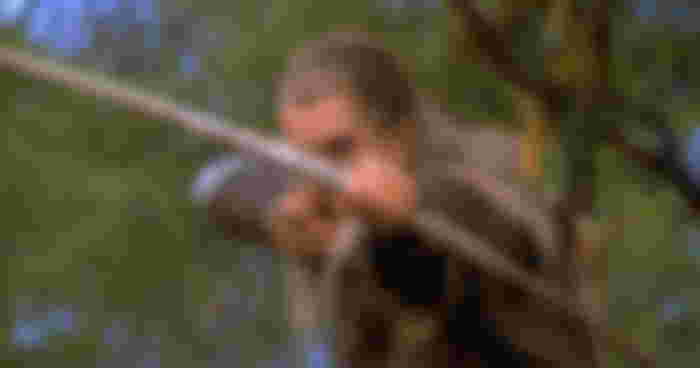 Legolas preparing to shoot Uruk Hai in The Lord of the Rings The Fellowship of the Ring