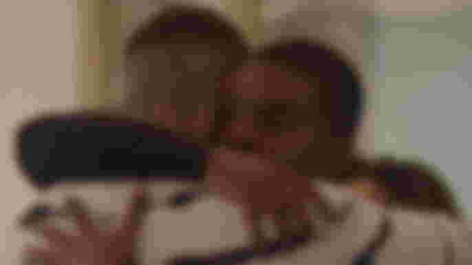 All American Season 4 Daniel Ezra as Spencer James hugging someone
