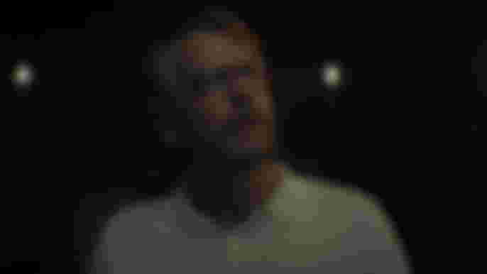 Greg Kinnear as Tom Lockwood in You Season 4 Part 2