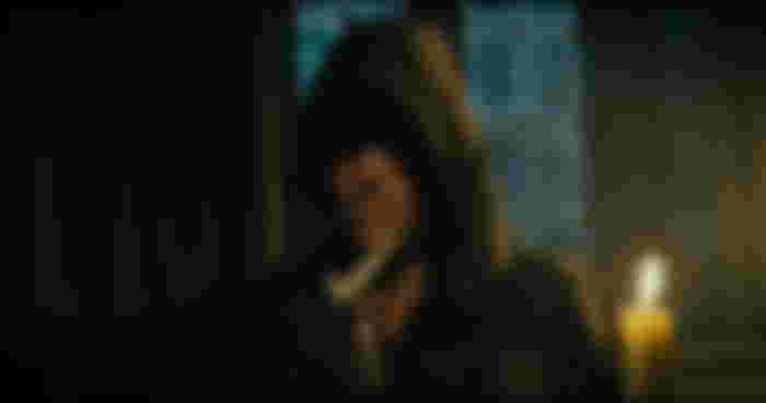 A hooded Aragorn in The Lord of the Rings: The Fellowship of the Ring
