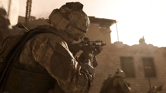 Image showing Modern Warfare player aiming down sights at broken building