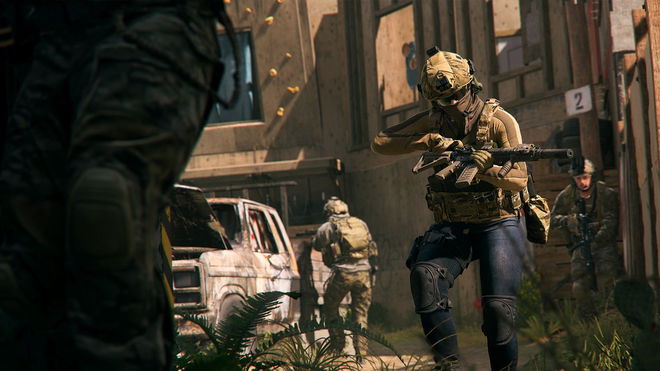 Warzone 2 player examining gun