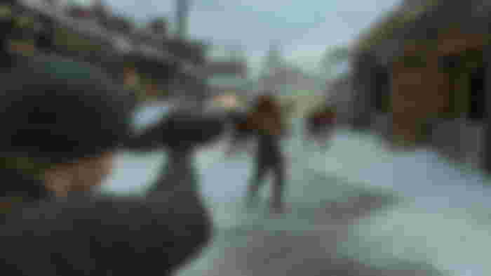 A Last Of Us character aiming their weapon at Infected