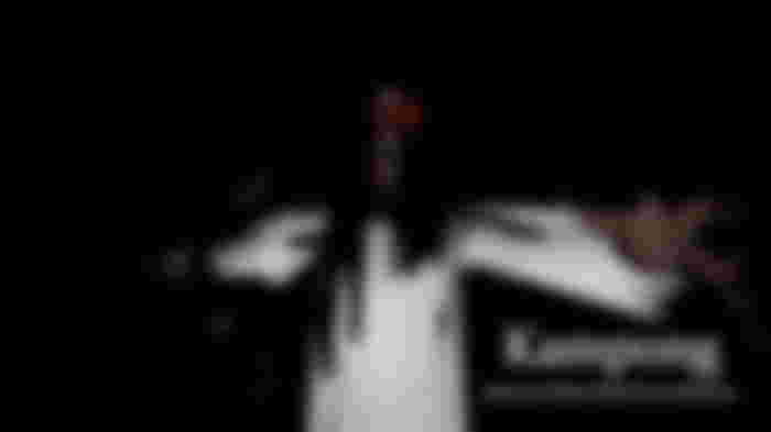 Screenshot from Kampong, showing a haunted figure approaching the screen