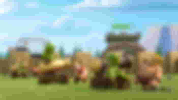 Screenshot from Clash of Clans, showing several soldiers gathered around two cannons