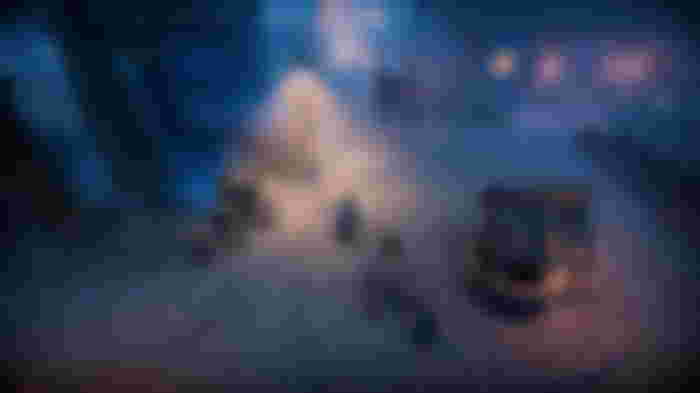 Image of a dusky village square in V Rising.