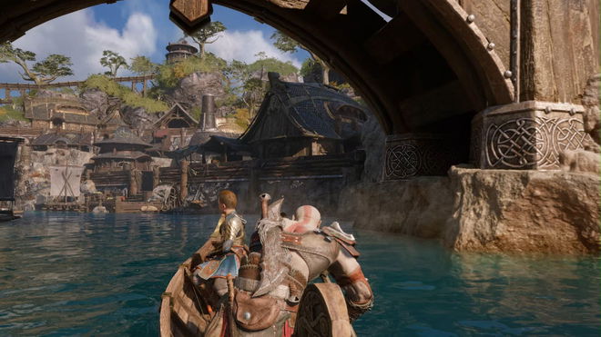 Kratos and Atreus in a boat in God of War Ragnarok