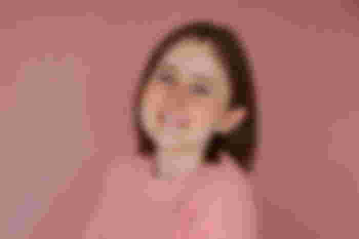 LilSimsie against a blank background.
