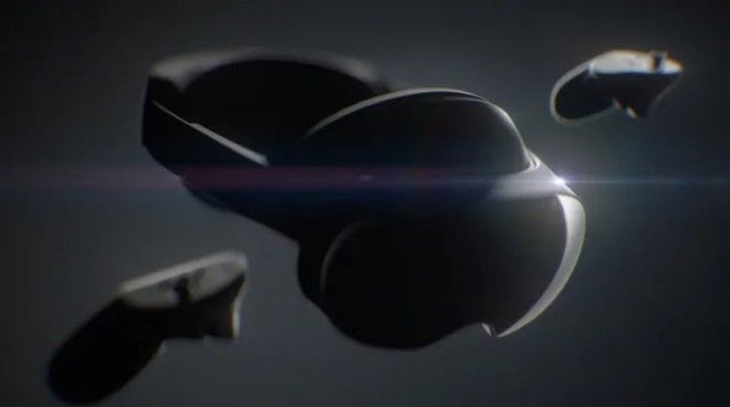 A black VR headset with a white light shining from behind it.