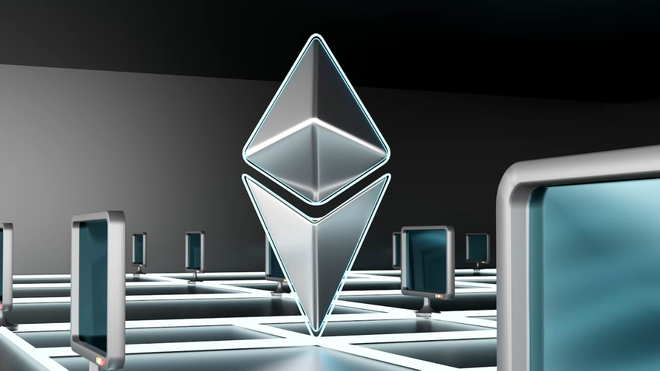 Ethereum logo next to computers.