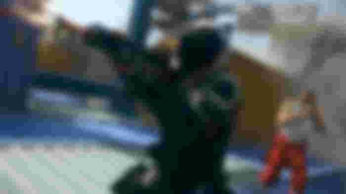 Warzone players aiming with guns on top of shipping containers