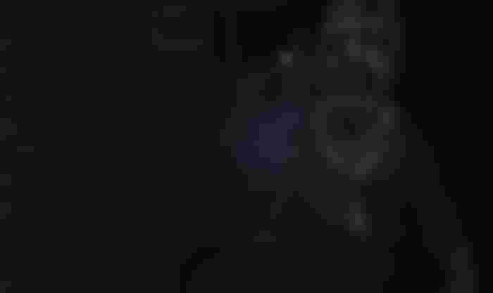 A player is approached by the ghost during its hunting phase in Phasmophobia.