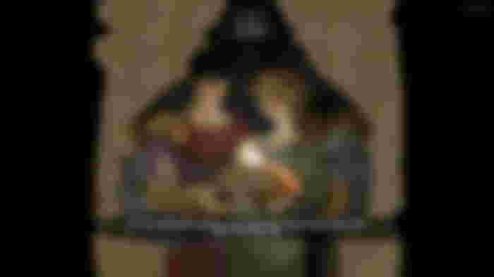 A painting of Hades, Persephone, and Zagreus holding a baby in Hades 2.