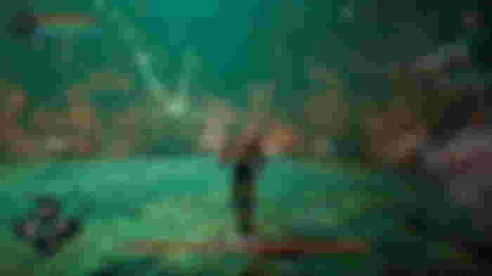Image of the player character fighting the Dementula boss in Dolmen.