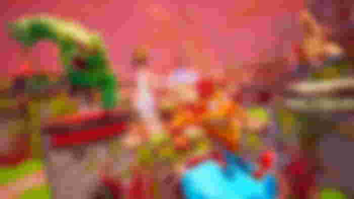 Crash being chased by an enemy in Crash Team Rumble.