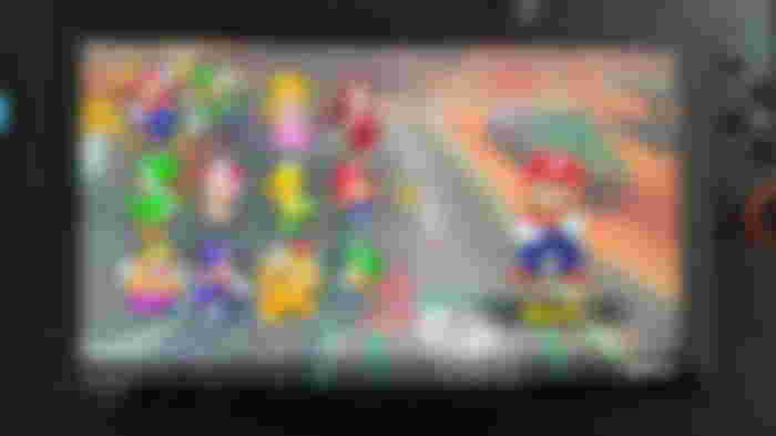 A selection of characters in Mario Kart World, with Mario selected.