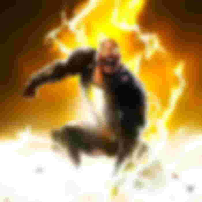 Dwayne Johnson as Black Adam smashing the ground angrily.