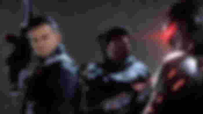 Modern Warfare 3 players standing in front of grey background
