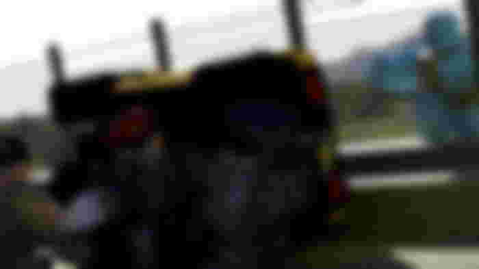 Screenshot from Zombie Uprising, with several Roblox characters shooting at zombies from behind cover