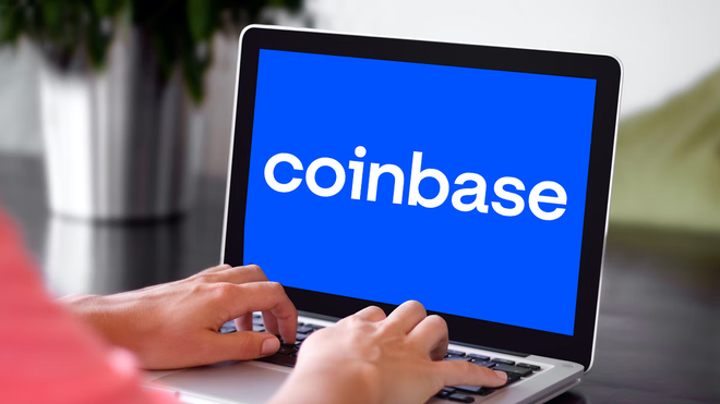 Coinbase logo on a laptop.