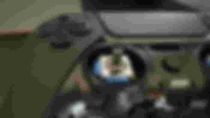 SCUF Reflex Pro in black with its left stick removed.
