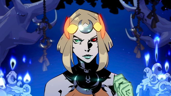 Melinoe looking towards the camera menacingly, with her glowing left-arm raised.