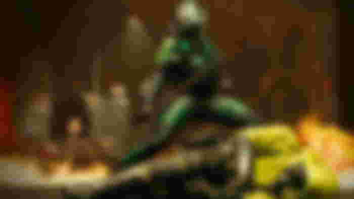 Modern Warfare 3 player holding Soulrender with body in foreground and fire in background