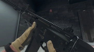 Screenshot of Modern Warfare 3 player holding TAQ V rifle