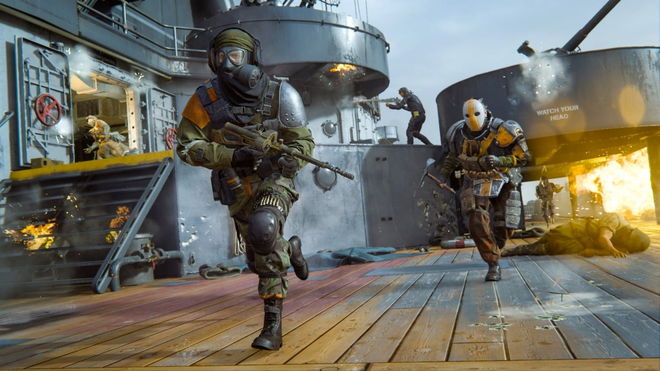 Image of soldiers running across a flaming rooftop in Call of Duty.