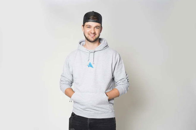 Ali-A on a blank background.