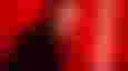 TikTok creator Inquisitor Ghost, aka Inquisitor3, holding a red lightsaber 