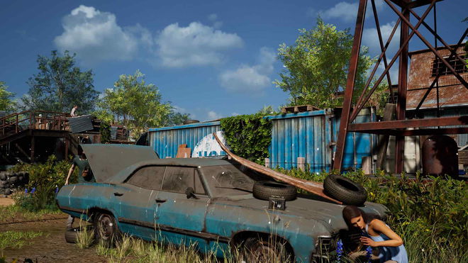 A survivor hiding behind a car in Texas Chain Saw Massacre.