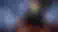 Cayde-6 from Destiny 2 The Final Shape sits in front of a fleet of spaceships 
