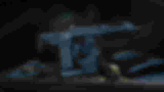 Screenshot of Warzone Tempus Razorback assault rifle on a table with an armour plate, ammunition, and a magazine beside it