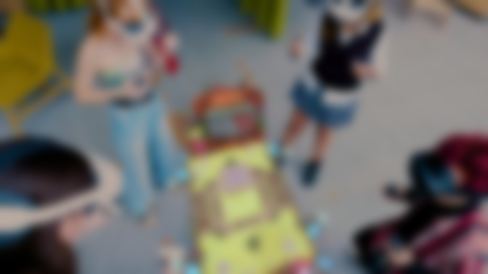 Best Meta Quest 3 mixed reality games - An image of four people playing with HMDs