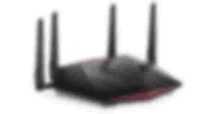 NETGEAR Nighthawk Pro Gaming XR1000 product image of a black WiFi router featuring four antennae and red trim at the front and back.