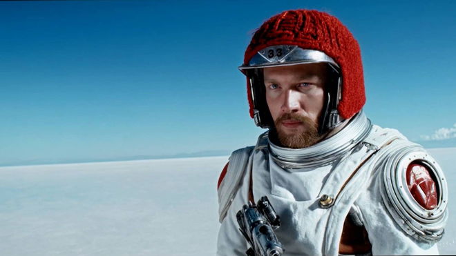 OpenAI Sora waitlist for early access - An image of a 30 year old space man wearing a red wool knitted motorcycle helmet