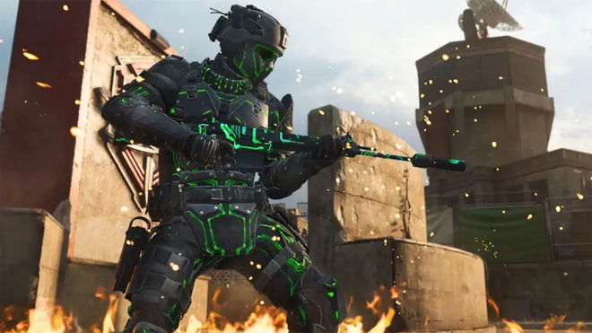 Modern Warfare 3 player holding gun with flames on ground