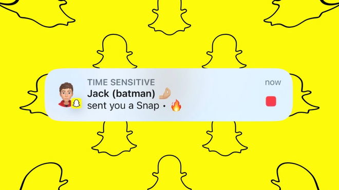 Snapchat notification showing a red square, indicating a new photo snap received, with yellow Snapchat ghost logos in the background.