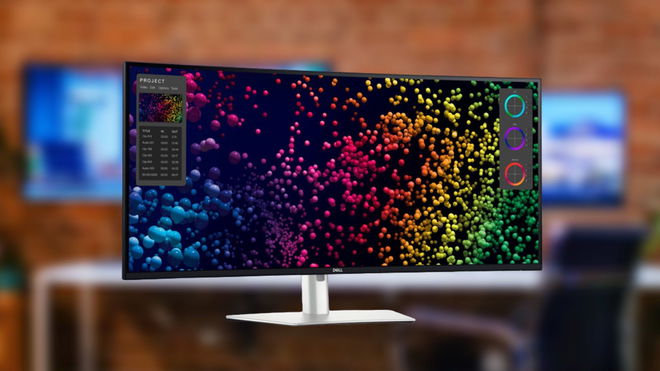 Dell's new Ultrawide 5K monitor in front of a blurred image